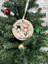 Load image into Gallery viewer, We are expecting snowman pregnancy announcement Christmas Ornament
