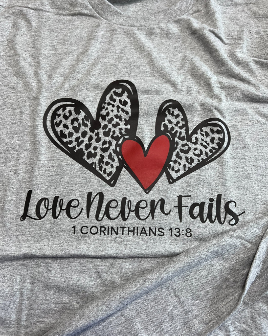 Love never fails long sleeve tshirt