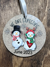 Load image into Gallery viewer, We are expecting snowman pregnancy announcement Christmas Ornament
