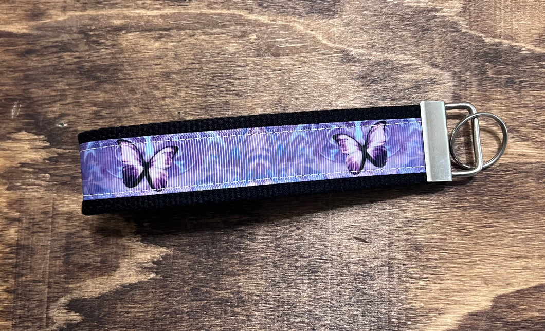 Purple butterfly wristlet